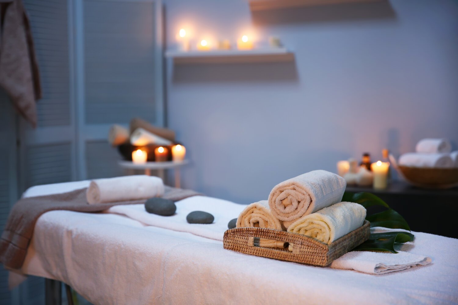 interior of modern massage room in candle light